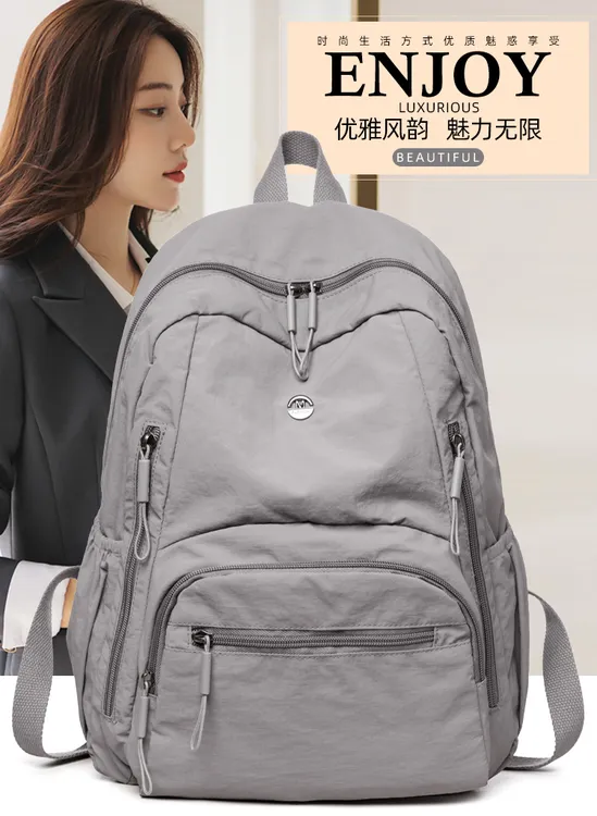 新款轻便大容量超轻潮流防水双肩包学生背包双肩背时尚休闲百搭