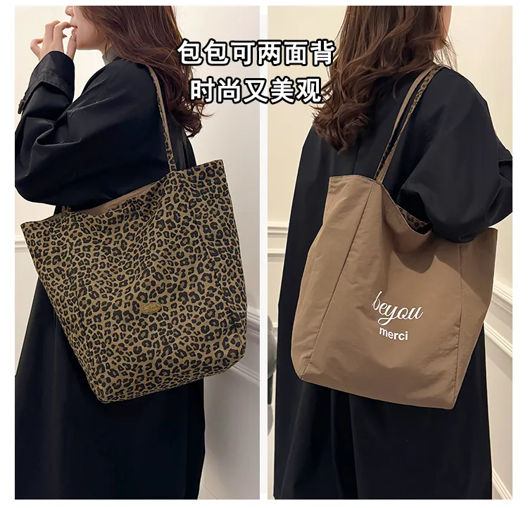 双面背豹纹帆布包女2025秋冬新款时尚学院风托特包简约休闲通勤包