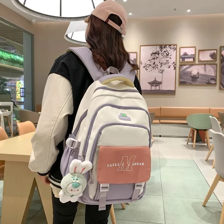 减负护脊超大容量中学生初中生书包女生高中生小学生新款双肩背包