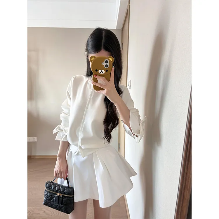 法式时尚小众拼接长袖蝴蝶结开衫上衣女秋季显瘦高腰半身裙a字裙
