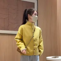 设计感小众气质高领纯色小扣子针织开衫女2024新款宽松长袖毛衣潮