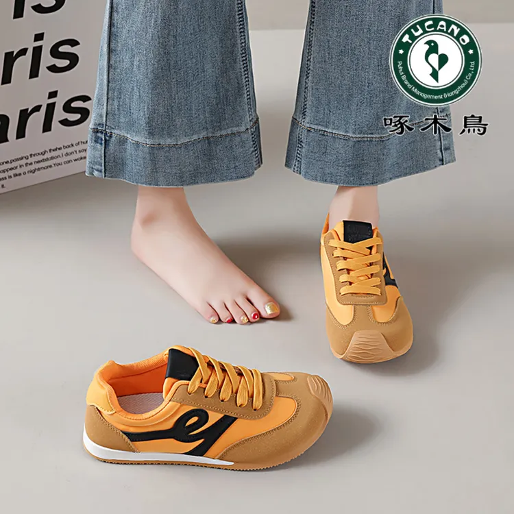 啄木鸟黄色德训鞋女2025新款夏季学生复古软底防滑耐磨阿甘运动鞋