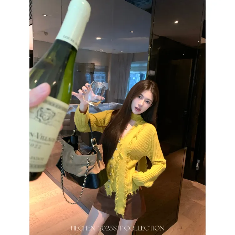 【禾呈】秋季时尚通勤气质小众毛边飘带针织上衣长袖女50569