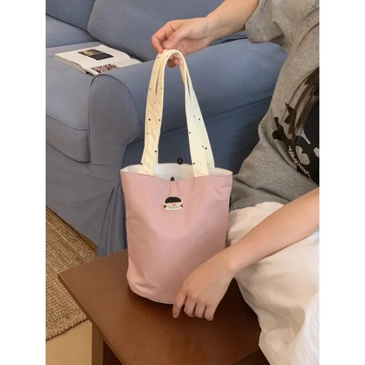可爱刺绣水桶包小号文艺手提帆布包女大容量百搭通勤包包夏天新款
