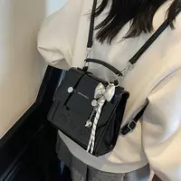 小众艾米简约女包百搭双肩包2025新款纯色时尚休闲洋气背包