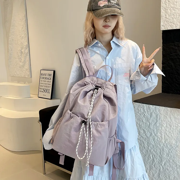 新品日韩抽带防潮森系护脊双肩包简约防水大学生高中小众学生书包