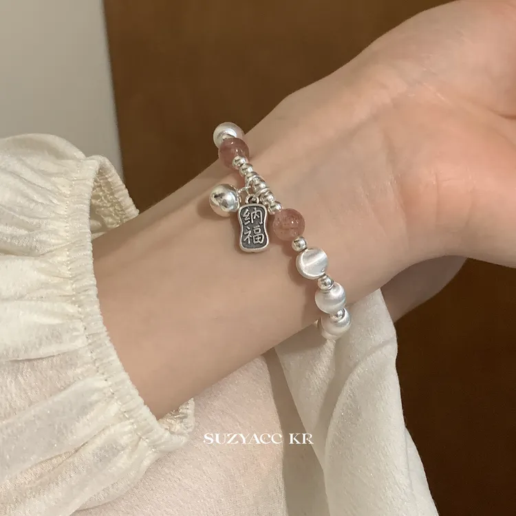 Suzyacc Kr 925银手链 【草莓纳福】小众猫眼银球弹力绳手链DC0092