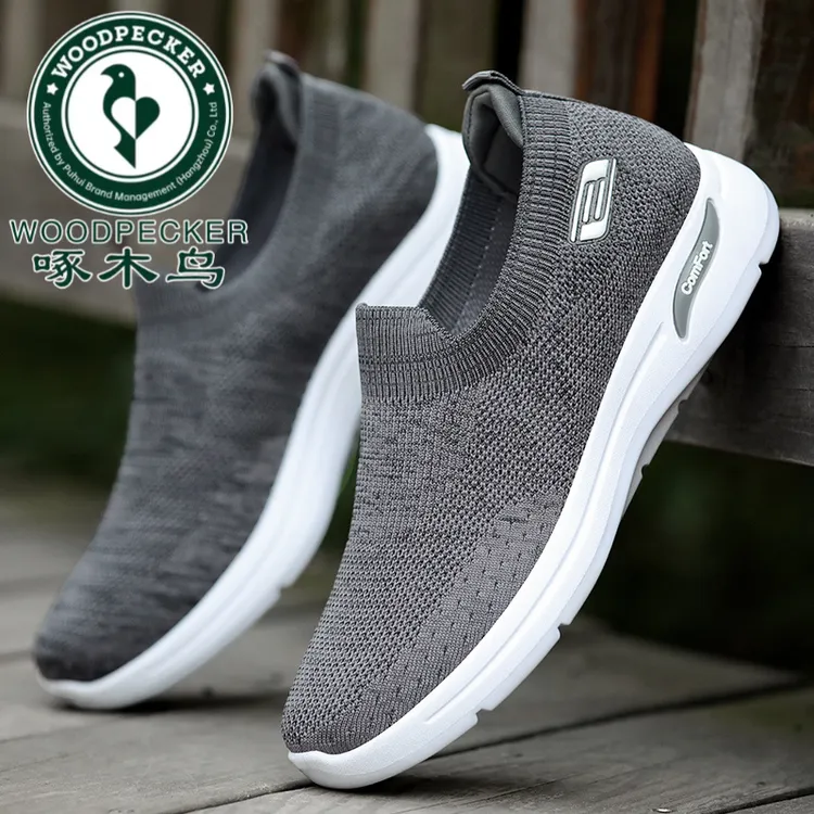 啄木鸟2025夏季新款一脚蹬飞织网面透气爸爸鞋软底防滑运动休闲舒
