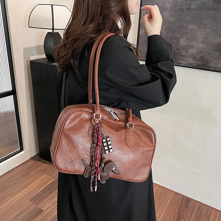 复古时尚手拎保龄球包女2025新款单肩包流行小方包纯色女包潮