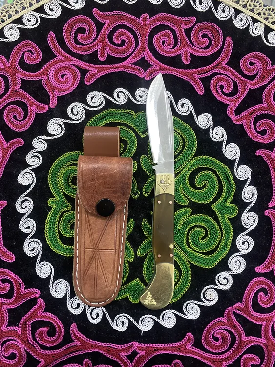 木垒手工牛角刀柄折叠小刀轴承钢牛皮刀鞘（未开刃，非管制刀具）