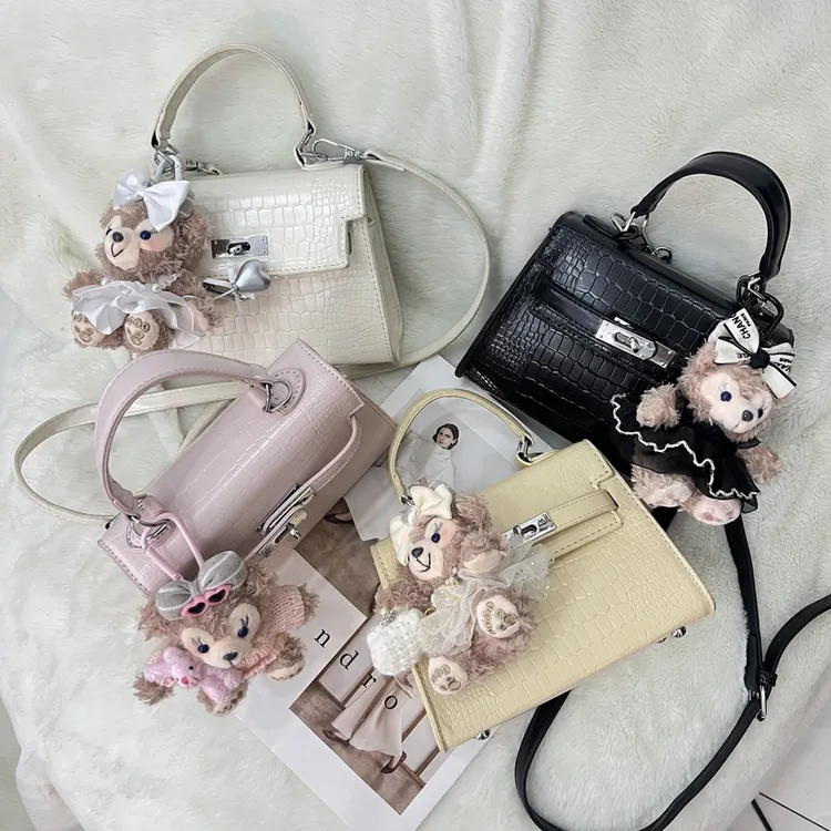 石头纹凯莉包2025新款纯色简约单肩斜挎包小众高级感金属扣小方包