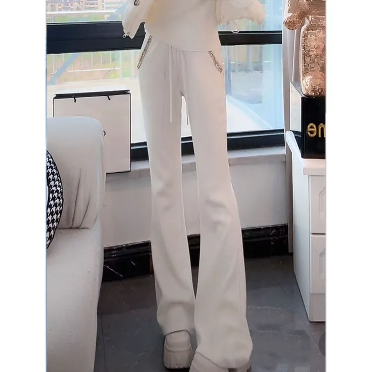 时尚百搭流行宽松休闲微喇裤女2025冬季新款显瘦加绒保暖白色裤子