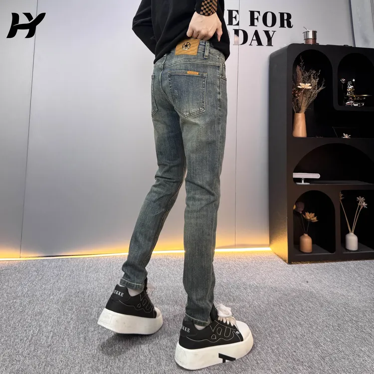 秋季休闲简约牛仔裤2025新款男士时尚潮流韩版百搭修身小脚长裤男