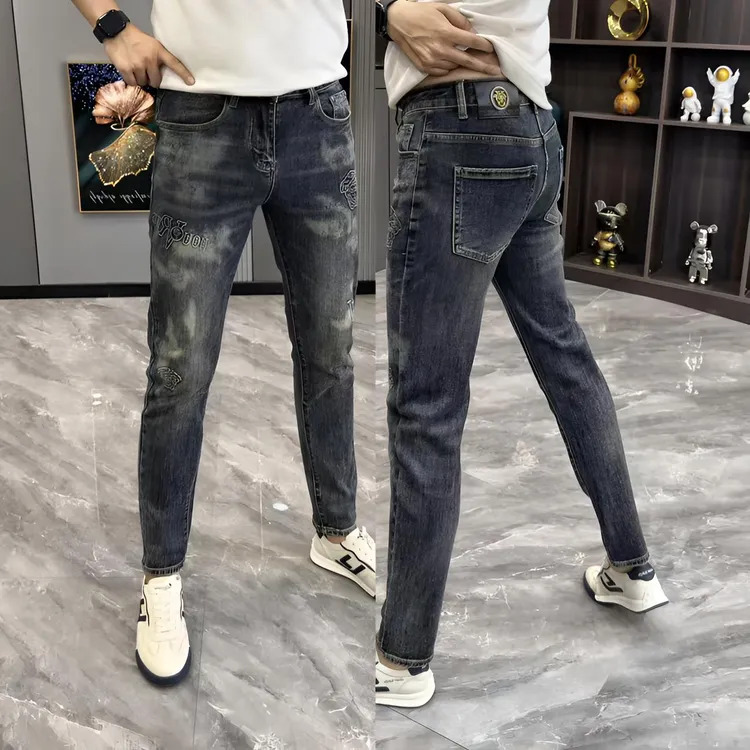 男士牛仔裤秋季新款时尚压花男裤个性水洗做旧小脚裤修身显瘦长裤