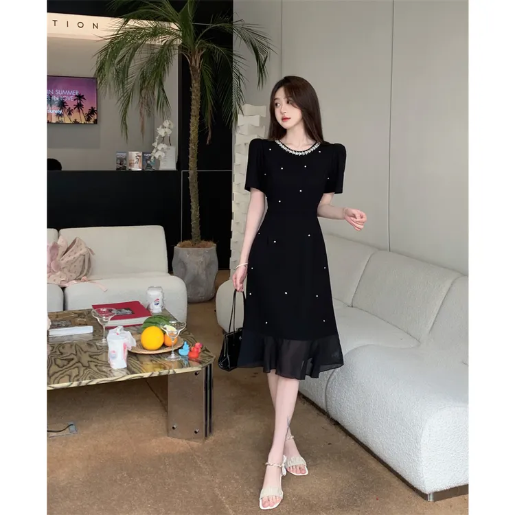 重工钉钻荷叶边收腰连衣裙女2025夏季时尚显瘦中长款裙子