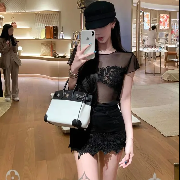 2025夏季新款宽松显瘦微透洋气上衣潮女配高街显瘦短裤不规则套装