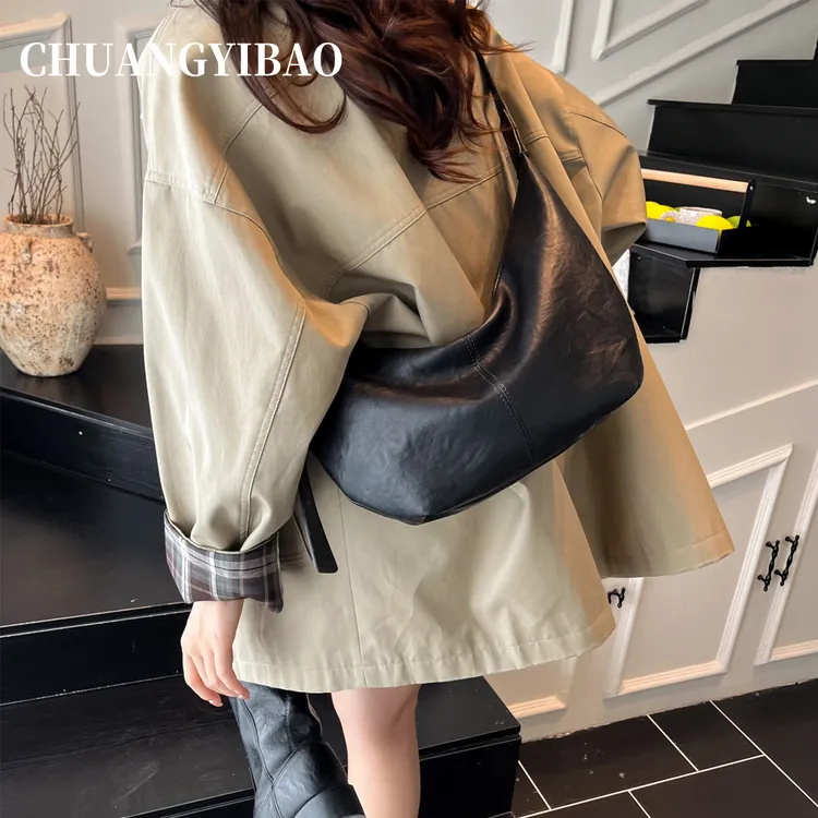 超火通勤百搭时尚高级感包包女式2025新款复古简约单肩斜挎饺子包