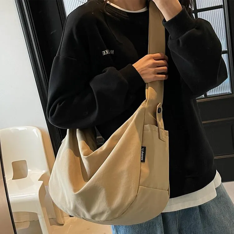 ins风休闲百搭韩版斜挎包大学生党上课通勤大容量饺子包单肩包