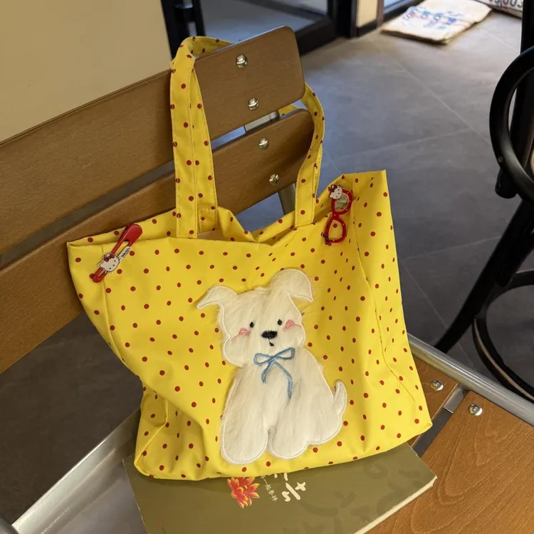 新款手提包收纳可爱小狗旅行学生2025大容量高颜值夏季购物休闲女