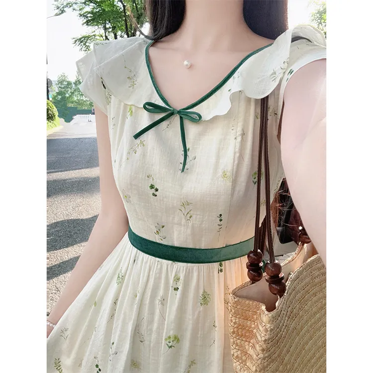 夏季新款时尚穿搭海边度假法式高级感独特漂亮掐腰绿色印花连衣裙