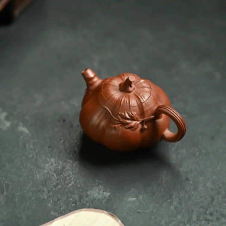 南瓜·全手工           /容量120cc/原矿朱泥 以瓜形为壶体紫砂壶