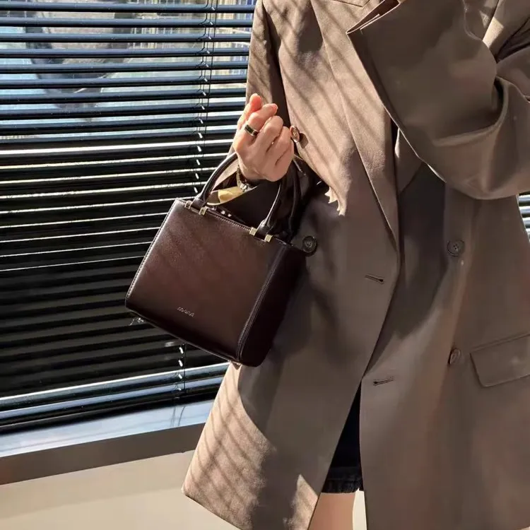 欧尚典真皮小众红色手提包女2025秋冬高级感超火轻奢链条斜挎小包