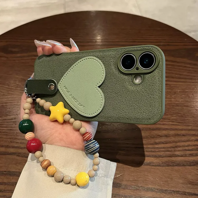 月坑纹抹茶绿皮爱心适用苹果16pro手机壳iPhone15promax新14pro女
