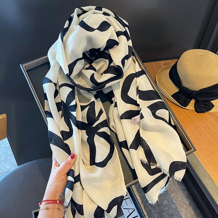 Miss Silas春秋韩版优雅时尚棉麻手感围巾女黑丝带蝴蝶结丝巾披肩