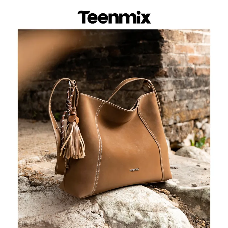 天美意女包2025新款流光风牛皮单肩斜挎包hobo百搭简约通勤托特包