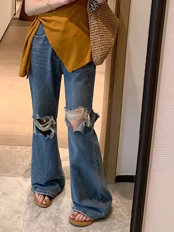 蓝色设计感破洞牛仔裤女2025春季新款大码梨形身材高腰微喇裤长裤