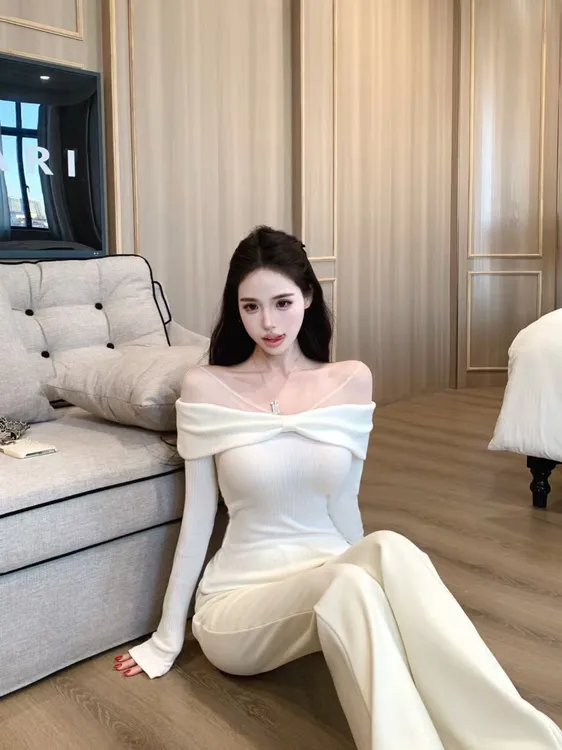 甜美一字肩网纱蝴蝶结针织衫女秋冬季后背镂空小心机长袖修身上衣