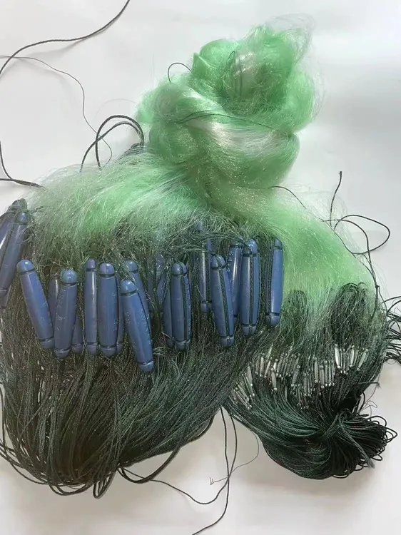 三层渔网浮网捕鱼鱼尾坠塑料浮漂进口绿丝漂网