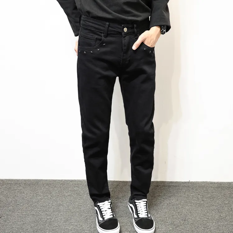 2025秋冬新款黑色牛仔裤长裤青年男士五角星铆钉水洗棉质百搭裤子