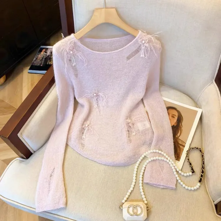 韩2025秋冬新款温柔风气质女人镂空设计感重工花朵长袖针织上衣女