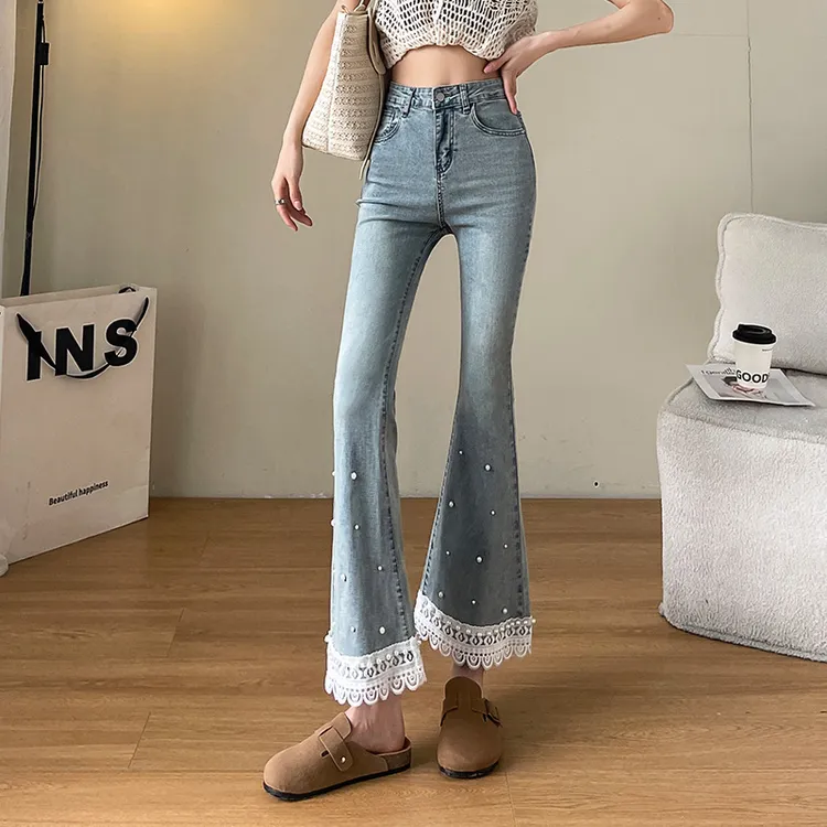 钉珠微喇牛仔裤女2025年春夏新款弹力个性蕾丝边拼接九分微喇叭裤