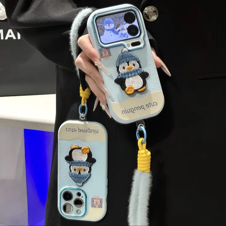 冬季刺绣企鹅支架挂绳适用苹果16/17promax手机壳华为vivoppo小米