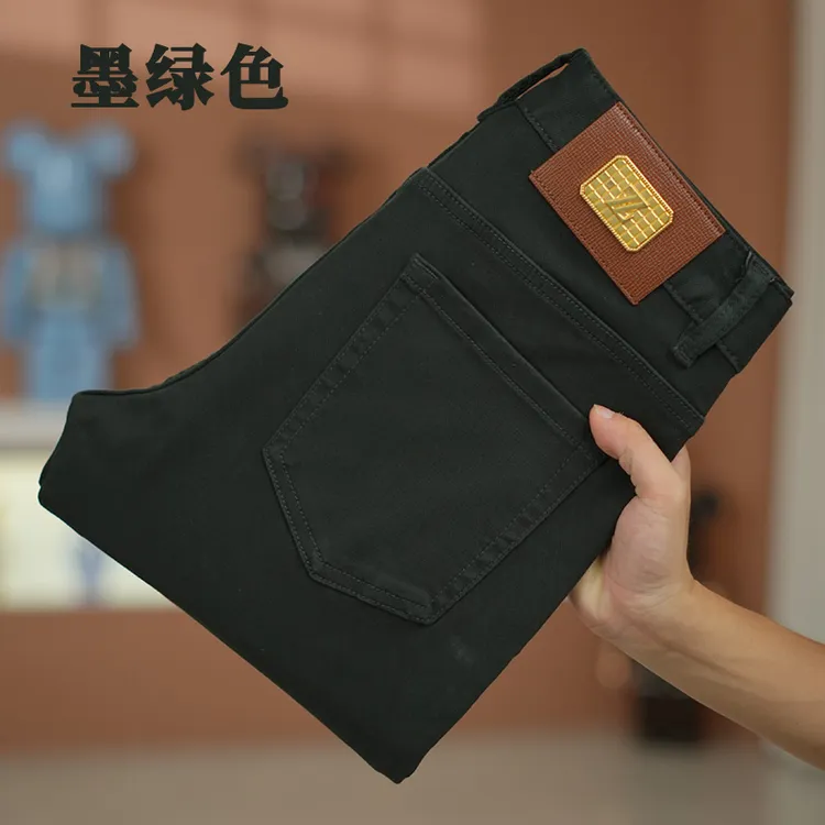 墨绿色牛仔裤男士2025秋季新款免烫抗皱高品质潮流修身款直筒长裤