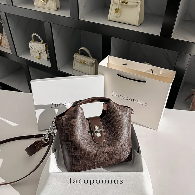 【雅各邦】真皮复古咖啡色水桶包女斜挎2025新款轻奢小众潮流