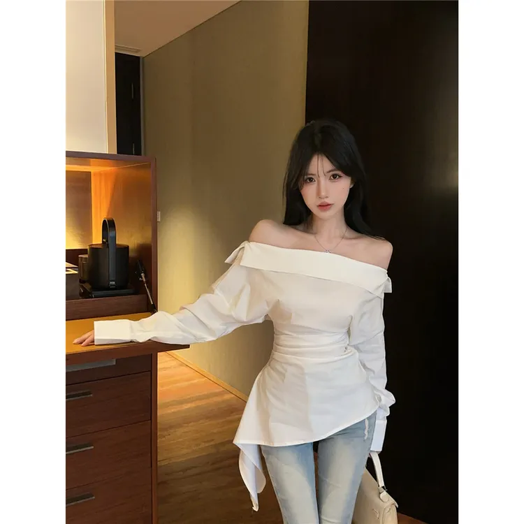 性感辣妹一字领斜肩气质收腰长袖衬衫修身显瘦不规则高级感上衣女