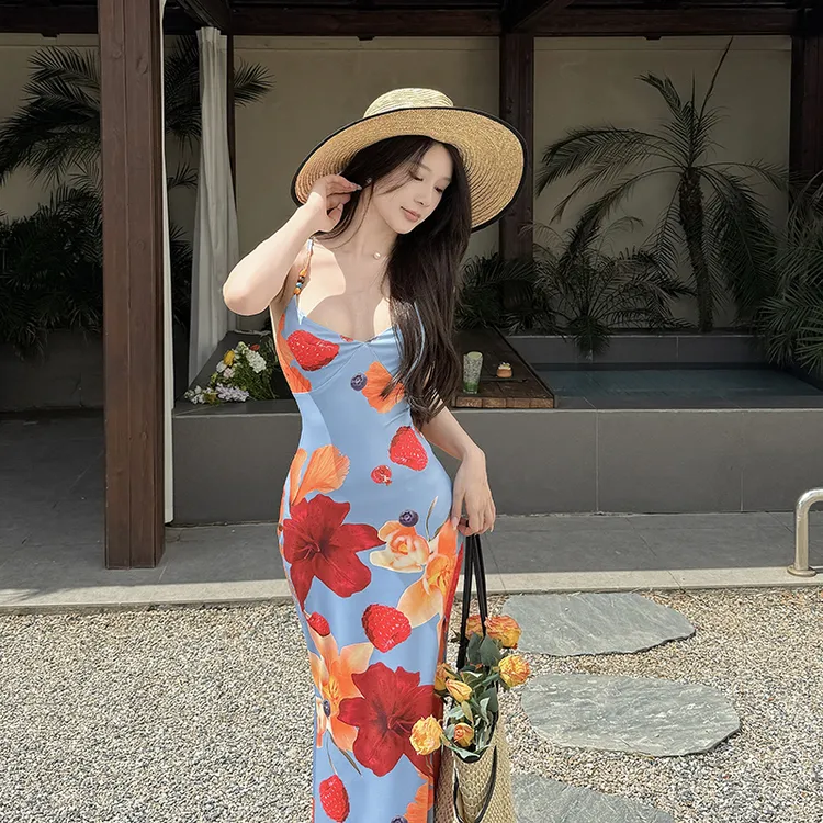 海岛度假风露背绑带蓝色连衣裙2025新款气质修身显身材包臀长裙