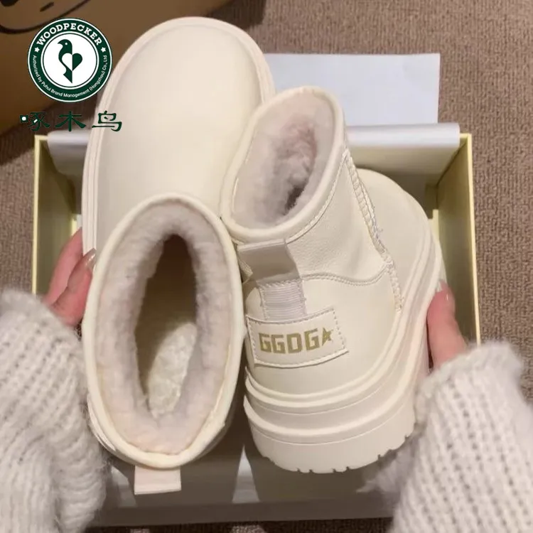 啄木鸟白色厚底雪地靴女冬季新款加绒加厚皮毛一体防水短靴子棉鞋