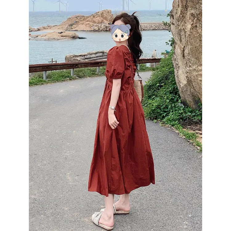 法式复古茶歇连衣裙女夏2025新款气质显瘦后背镂空泡泡袖v领长裙