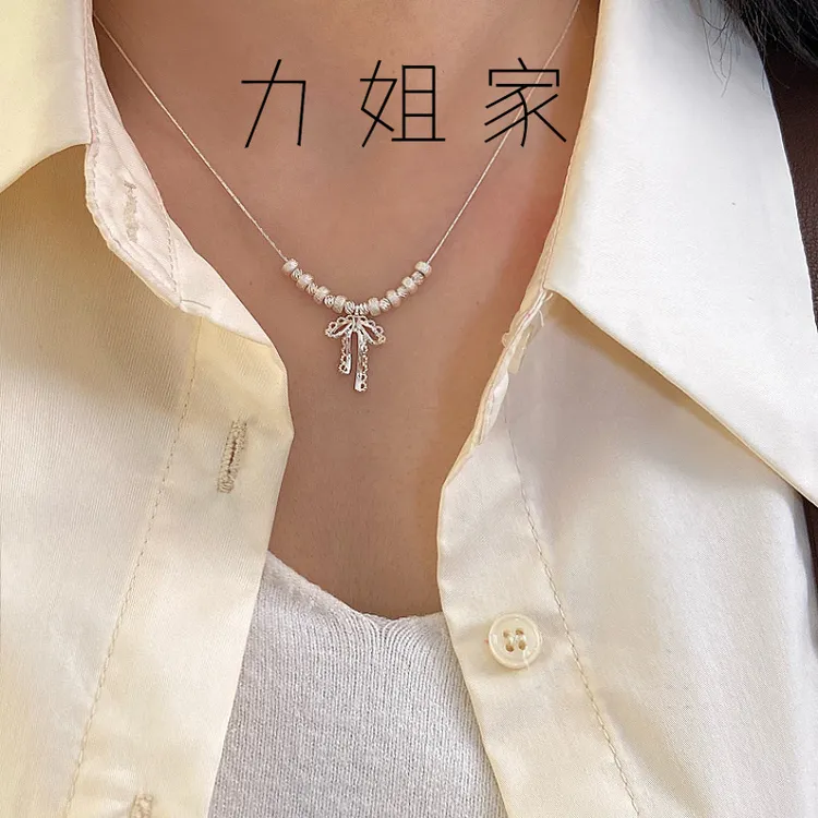 铜合金项链 蝴蝶结镂空蕾丝花边芭蕾风串珠吊坠项链女精致气质