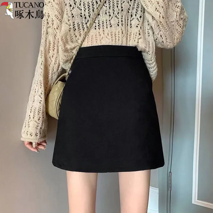 啄木鸟黑色毛呢半身裙秋冬新款高腰显瘦短裙秋冬女款爆款2025新款