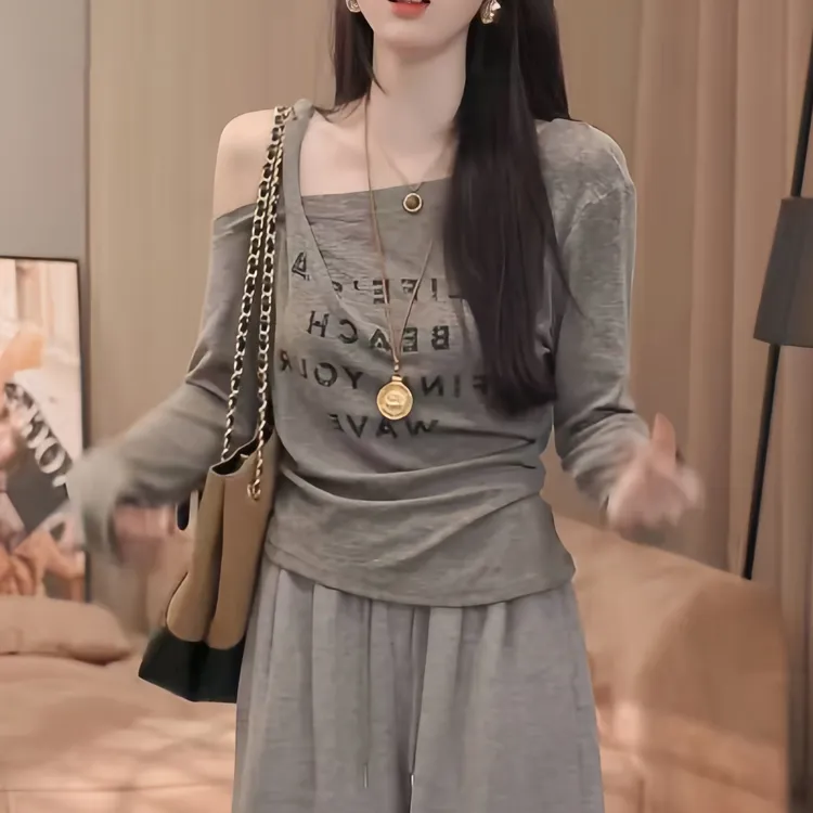 秋季新款欧货字母洋气拼接显瘦长袖T恤女设计感时尚小众上衣潮流