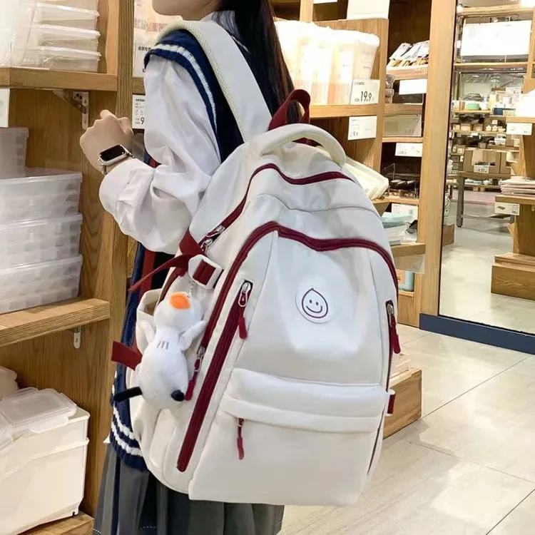 书包女学生ins小众初中生高韩版大容量高颜值简约双肩包耐用