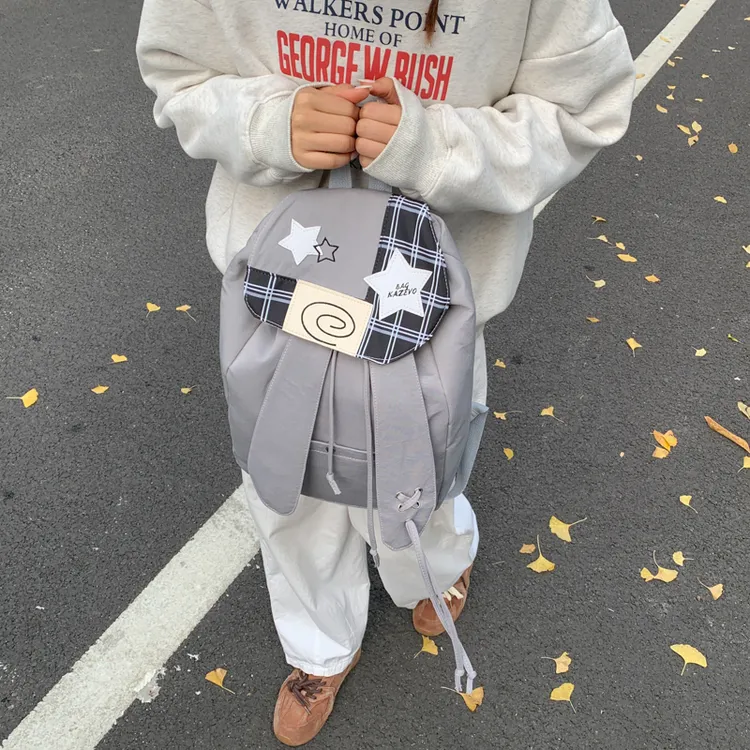 高颜值兔子耳朵翻盖束口双肩包出游通勤小书包INS涂鸦旅行包背包