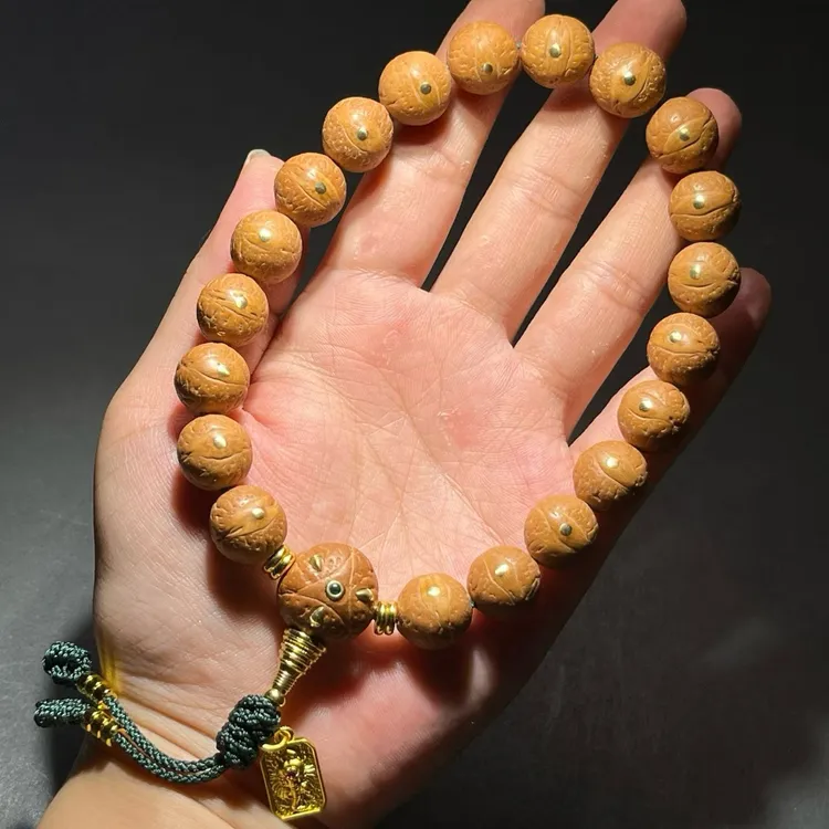 龙爪镶嵌实心籽凤眼菩提手持流苏三通藏式文玩精品菩提手串送人礼