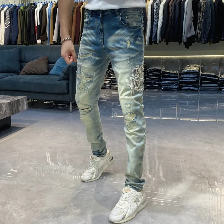 【也许家】新品男士破洞刺绣欧货修身弹力小脚个性帅气牛仔裤CC6092