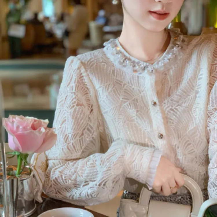 春装新款重工钉珠亮片立领木耳边压线女喇叭袖上衣